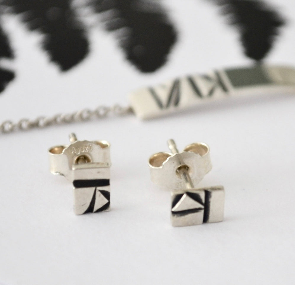 Zilveren oorbellen geometric stripe