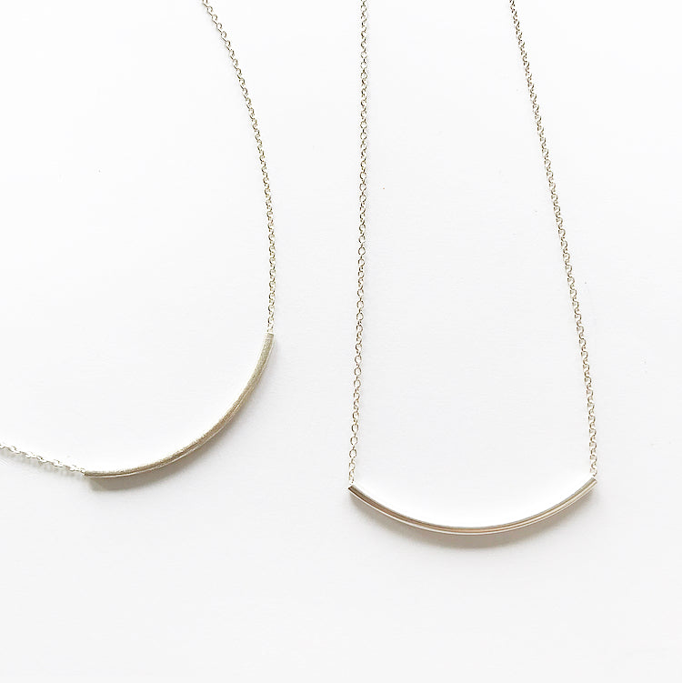 Zilveren collier boog
