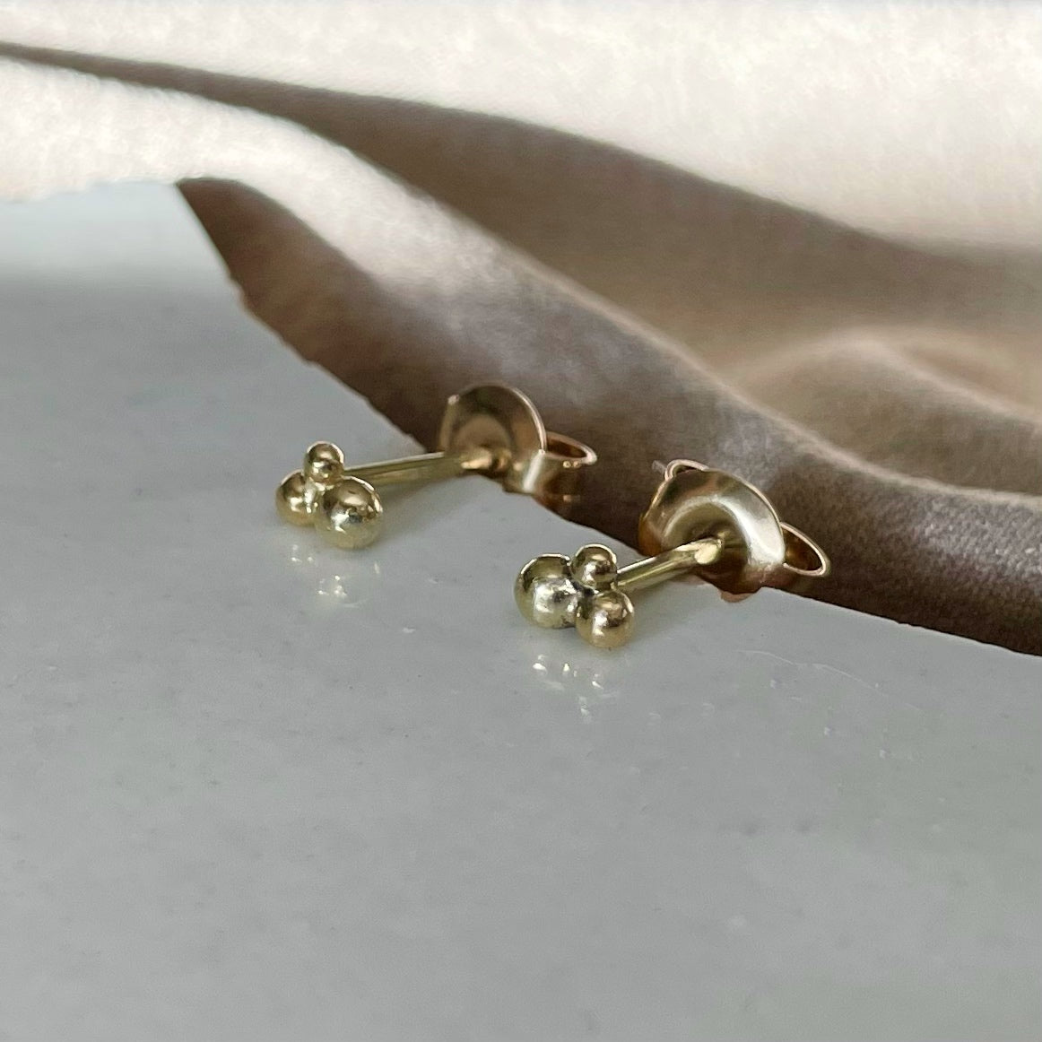 Gouden oorknoppen bolletjes