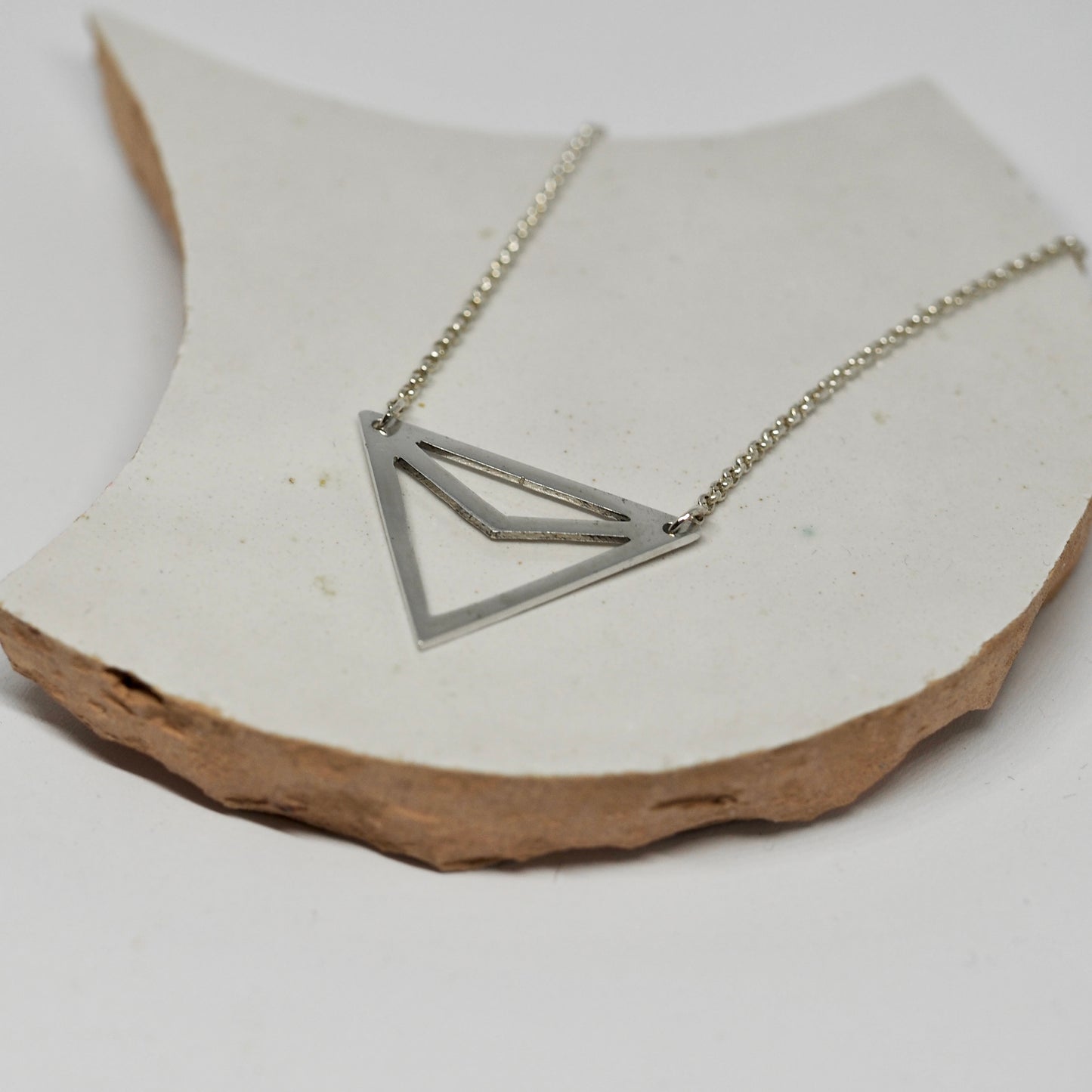 Zilveren collier triangle