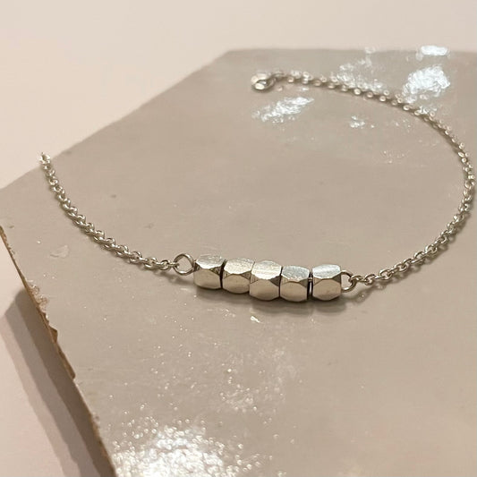 Zilveren armband met 5 facetjes