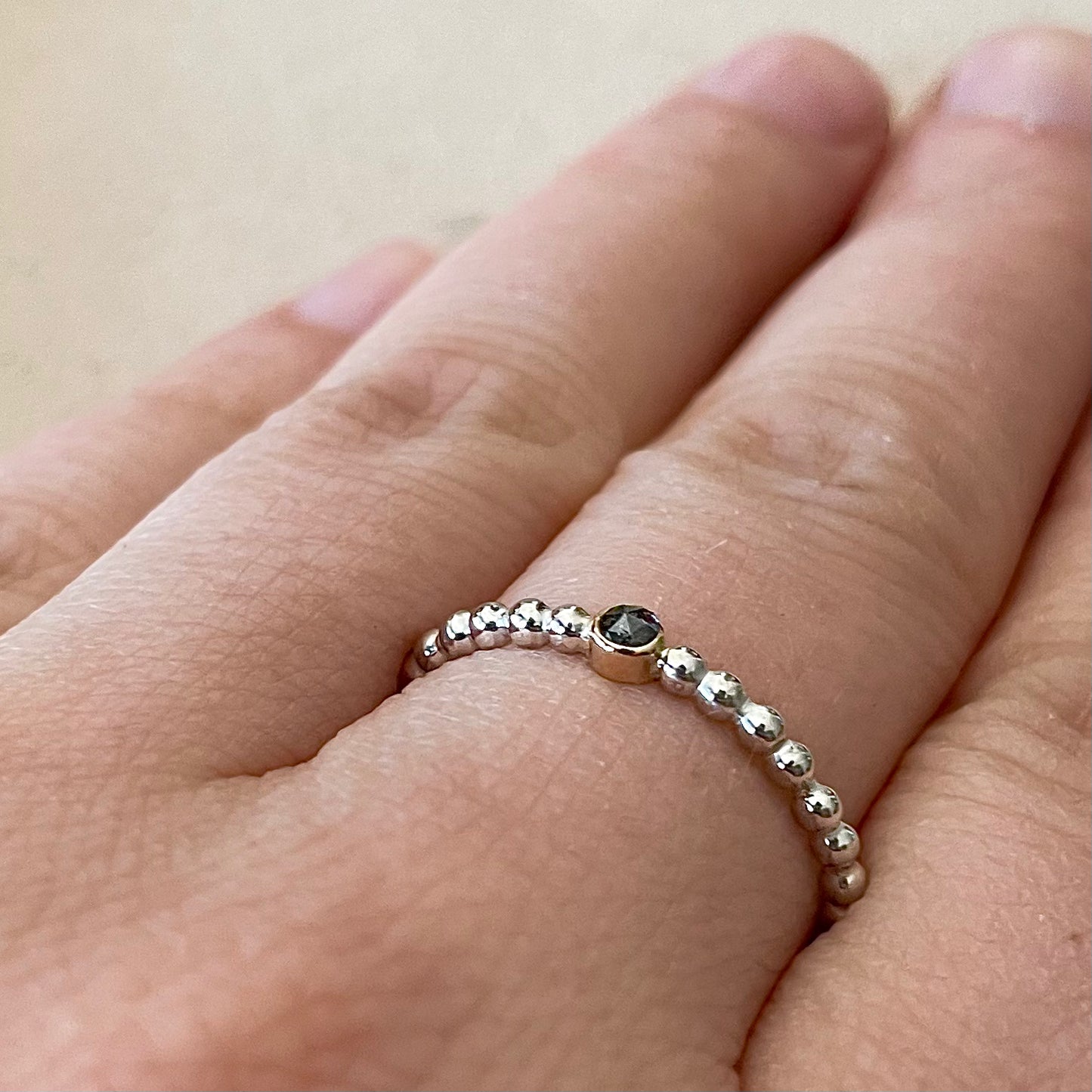 Zilveren ring met rosé zetkast met diamant