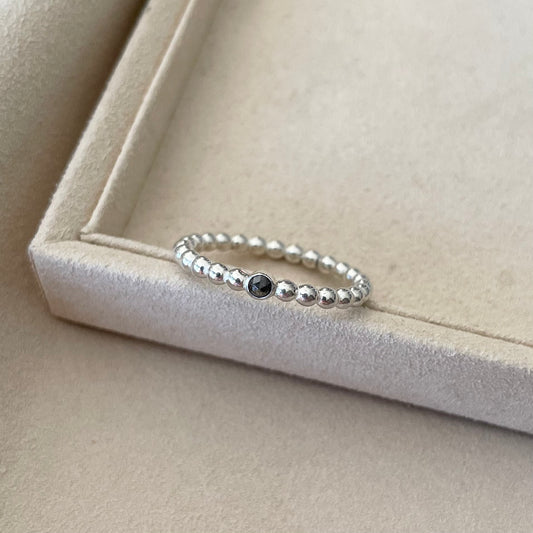 Zilveren ring met zout & peper diamant