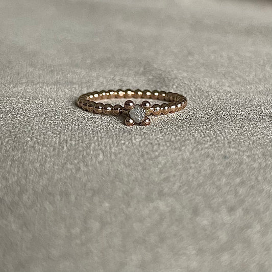 Gouden ring met ruwe diamant